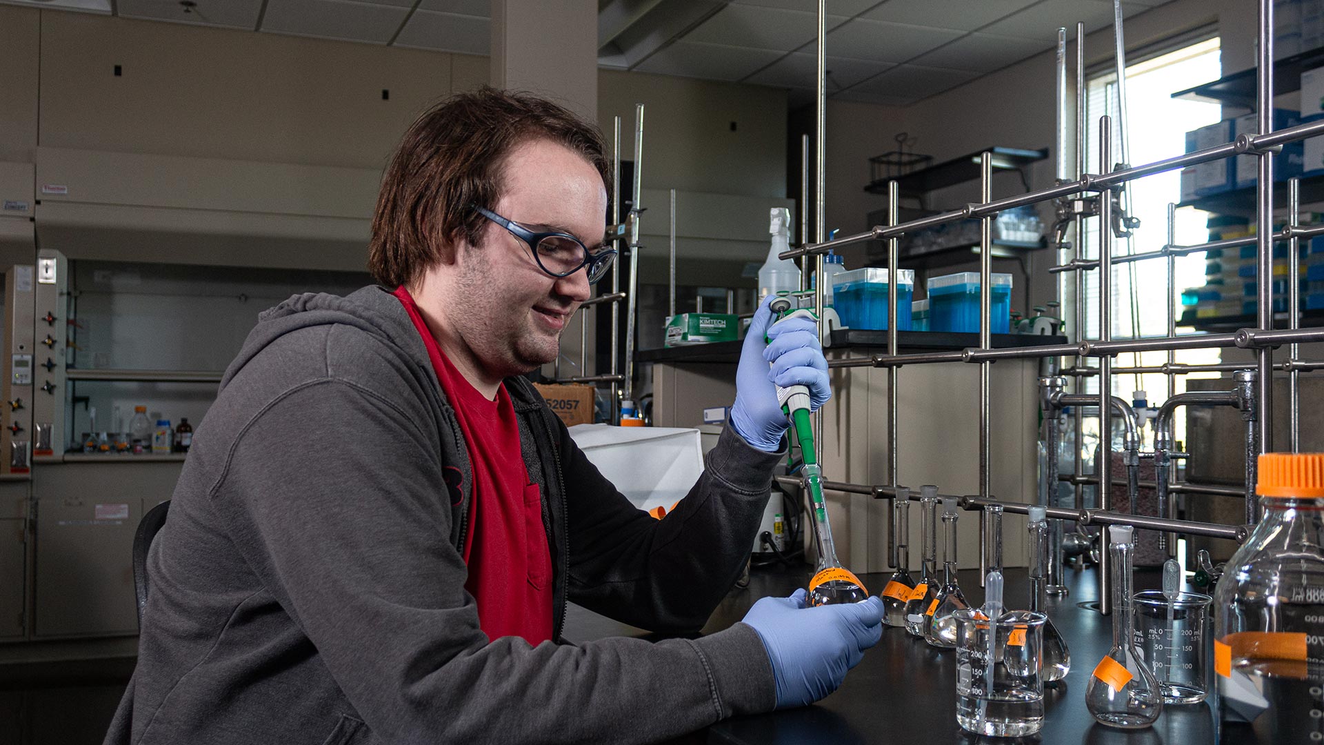 Male Student working on bioscience experiment