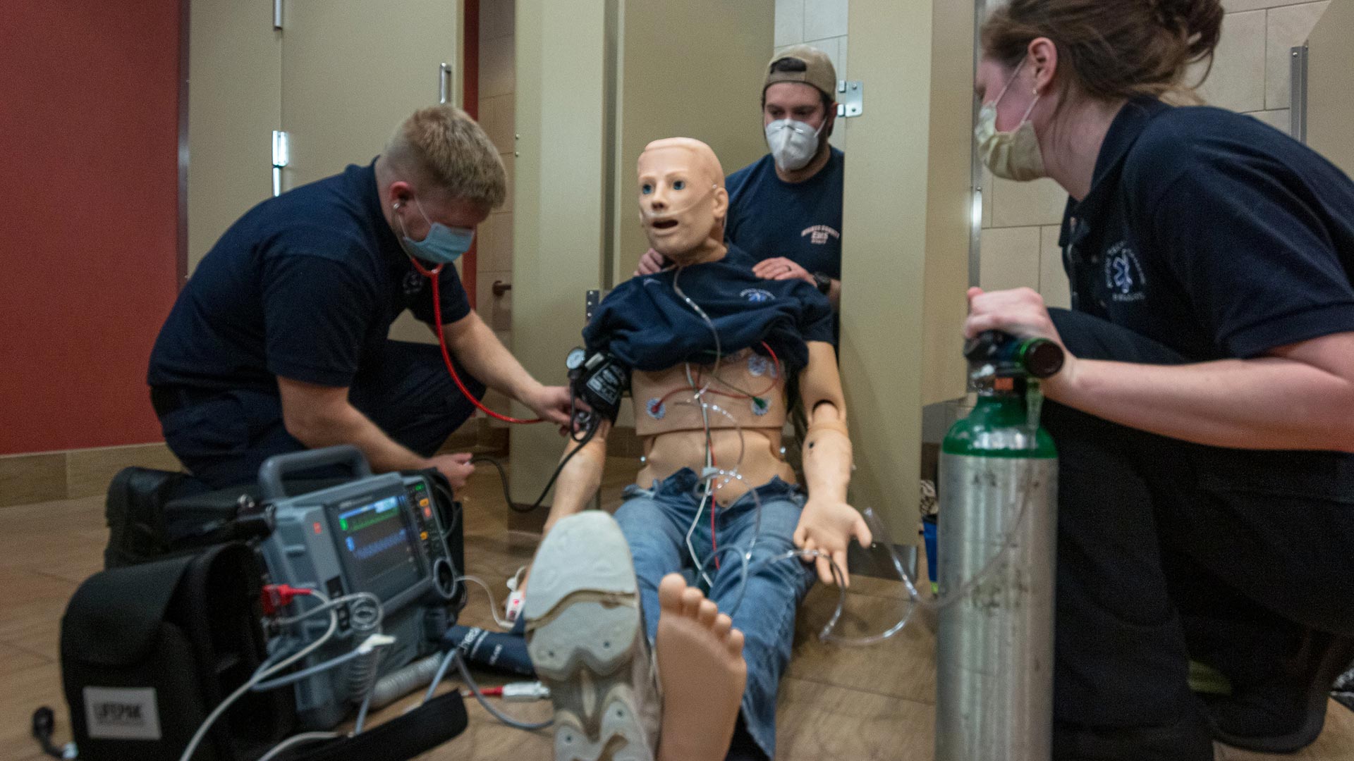 Paramedicine students working on a dummy